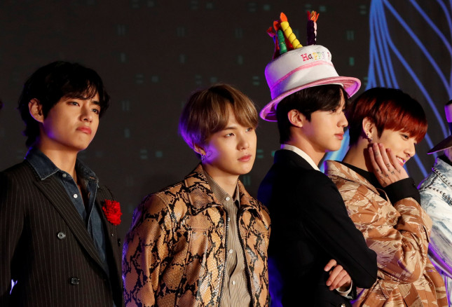 V, Suga, Jin and Jungkook, members of South Korean boy band BTS pose on the red carpet during the annual MAMA Awards at Nagoya Dome in Nagoya