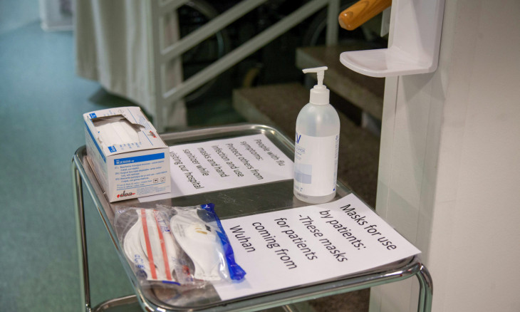 Masks and hand sanitiser are layed out at health centre in Ivalo