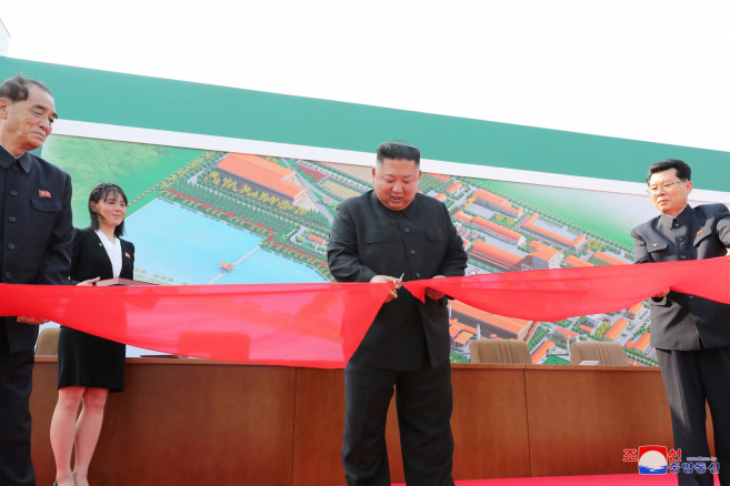 North Korean leader Kim Jong Un attends the completion of a fertiliser plant north of Pyongyang, together with his younger sister Kim Yo Jong