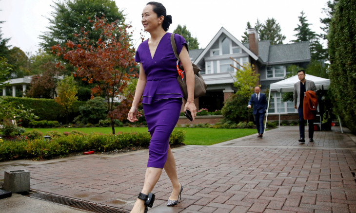 FILE PHOTO: FILE PHOTO: Huawei Technologies Chief Financial Officer Meng Wanzhou leaves her home