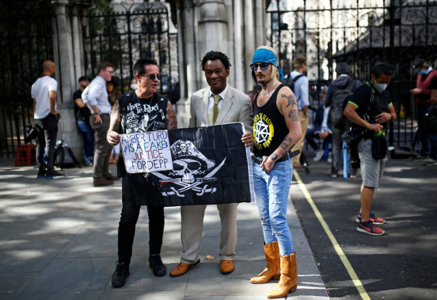 Supporters of actor Johnny Depp wait for him