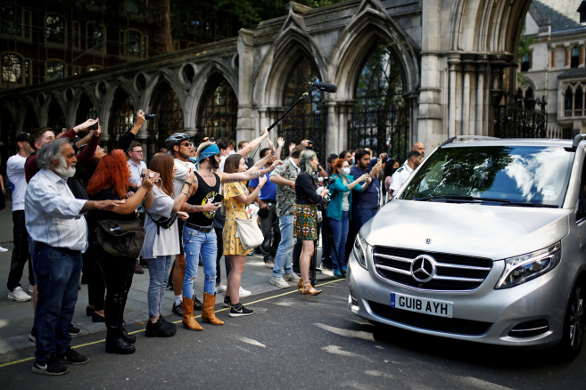 Supporters of actor Johnny Depp react as he leaves the High Court