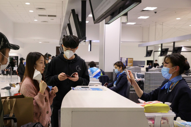 Maggie Zhang and her boyfriend Sunny Gu  check in at Kingsford Smith International Airport 