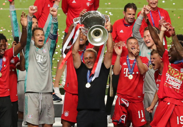 0 Bayern Munich coach Hansi Flick celebrates with the trophy after winning the Champions League