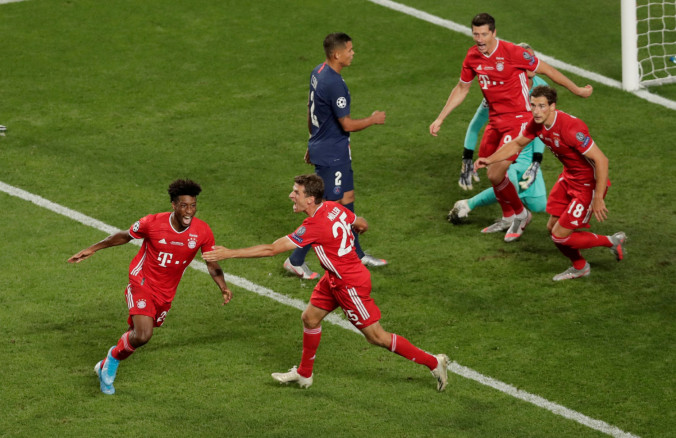 Bayern Munich's Kingsley Coman scores their first goal with Thomas Muller