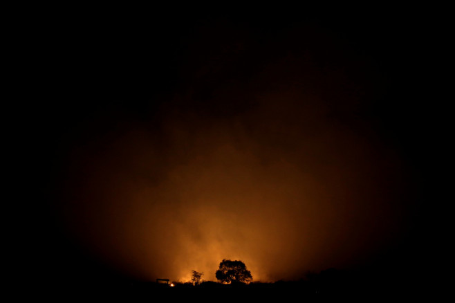 A tract of the Amazon jungle burns as it is cleared by loggers and farmers 