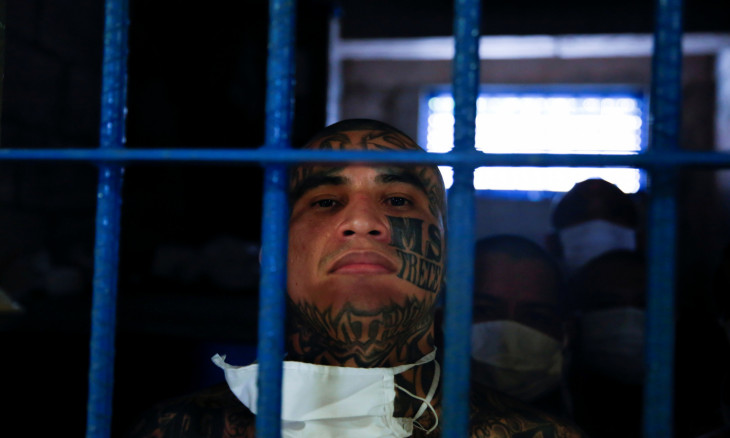 A gang member is seen inside his cell 