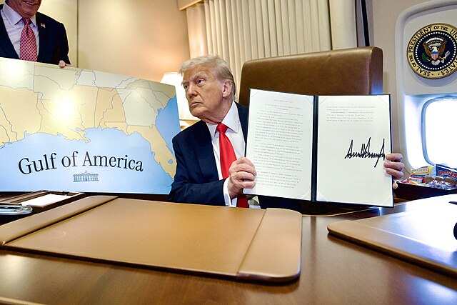 Trump Imposes 30 Tariffs on EU - President Donald Trump On Air Force One Poses Next To A Map Of The Gulf Of America During A Flight To New Orleans On February 9 2025