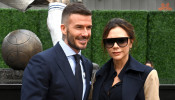 David Beckham (left) and wife and recording artist Victoria Beckham