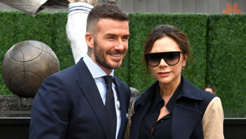 David Beckham (left) and wife and recording artist Victoria Beckham