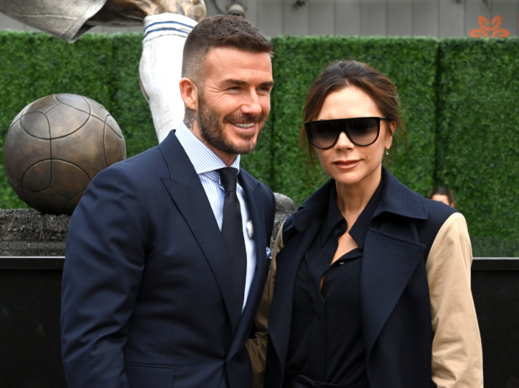 David Beckham (left) and wife and recording artist Victoria Beckham