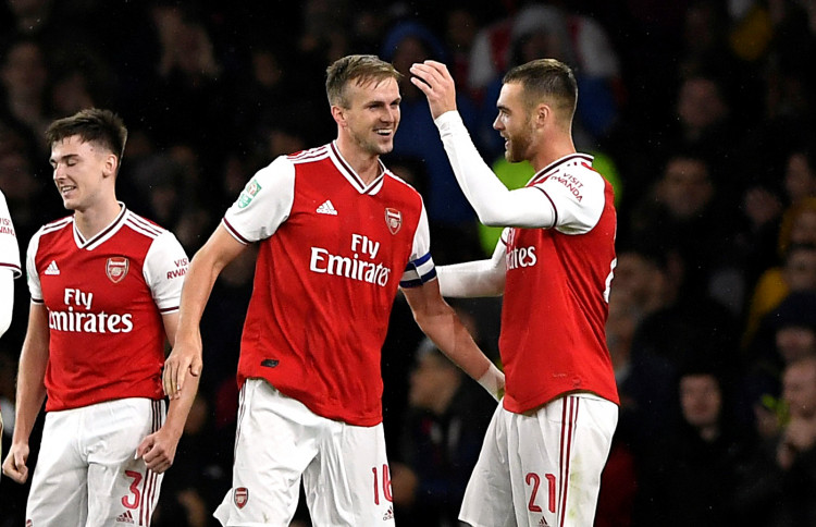 Soccer Football - Carabao Cup - Third Round - Arsenal v Nottingham Forest - Emirates Stadium, London, Britain - September 24, 2019 Arsenal's Rob Holding celebrates scoring their second goal Action Images via Reuters/Tony O'Brien