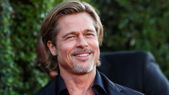 Cast member Brad Pitt poses at the premiere for the film 