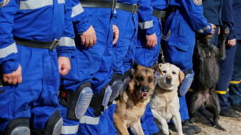 Ukrainian servicemen with their dogs take part in a joint drill of departments of Interior Ministry at the International training Centre near the village of Stare in Kiev region, Ukraine September 30, 2019. 