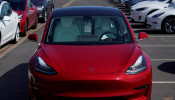 A new Tesla Model 3 is shown at a delivery center on the last day of the company's third quarter, in San Diego