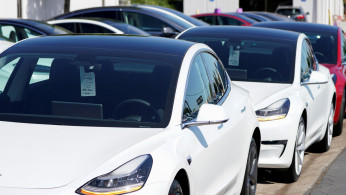 A new Tesla Model 3 is shown at a delivery center on the last day of the company's third quarter, in San Diego