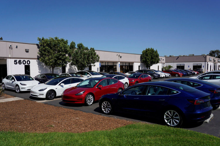 New Tesla vehicles are shown at a delivery center on the last day of the company's third quarter, in San Diego