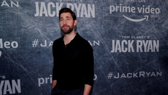 Cast member and executive producer John Krasinski poses at a premiere for the television series 