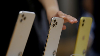 Apple's new iPhone 11 Pro Max, 11 Pro and 11 are displayed after they went on sale at the Apple Store in Beijing