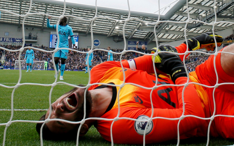 Hugo Lloris reacts after sustaining an injury as Brighton and Hove Albion's Neal Maupay scored their first goal Action Images via Reuters/Andrew Couldridge