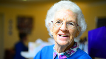 Woman smiling.