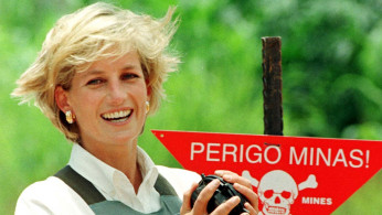 FILE PHOTO: Diana, Princess of Wales holds a landmine in one of the safety corridors of the landmine field in Huambo, Angola, January 15, 1997 during a visit to help a Red Cross campaign outlaw landmi