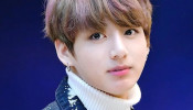 BTS Jungkook shares post workout selfie and ARMY freaks out of his long hair and tattoos. Photo by Yun_Q/Flickr