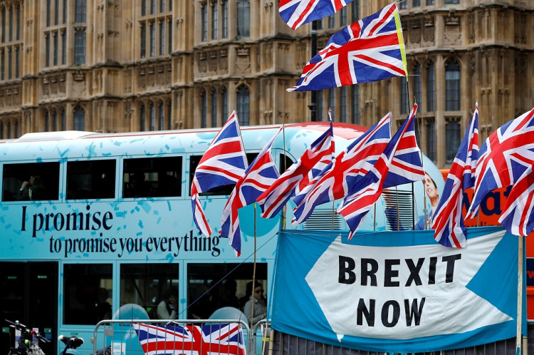 A passenger bus passes a pro-Brexit demonstration in Westminster, London, Britain, September 30, 2019. 