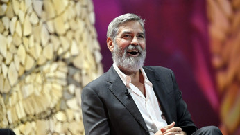 U.S. actor and director George Clooney speaks during the Nordic Business Forum in Helsinki