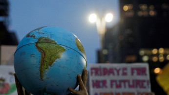A person holds an earth globe during the Global Climate Strike of the Fridays for Future movement in Sao Paulo, Brazil September 20, 2019. 