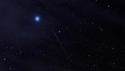 Meteors of the Orionid Meteor Shower streak through the night sky above the San Rafael Swell