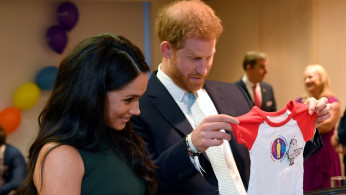 Britain's Prince Harry and Meghan, Duchess of Sussex, attend the WellChild Awards Ceremony in London