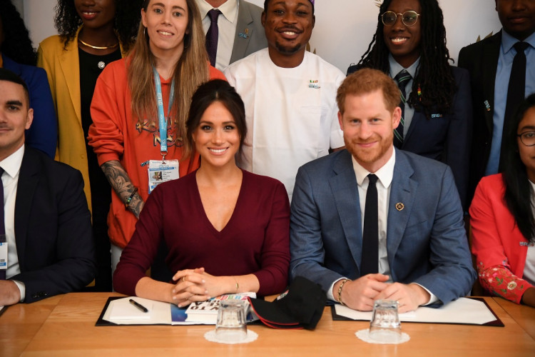 Britain's Meghan, the Duchess of Sussex, and Prince Harry, Duke of Sussex, attend a roundtable discussion with The Queen's Commonwealth Trust (QCT) and One Young World at Windsor Castle, Windsor