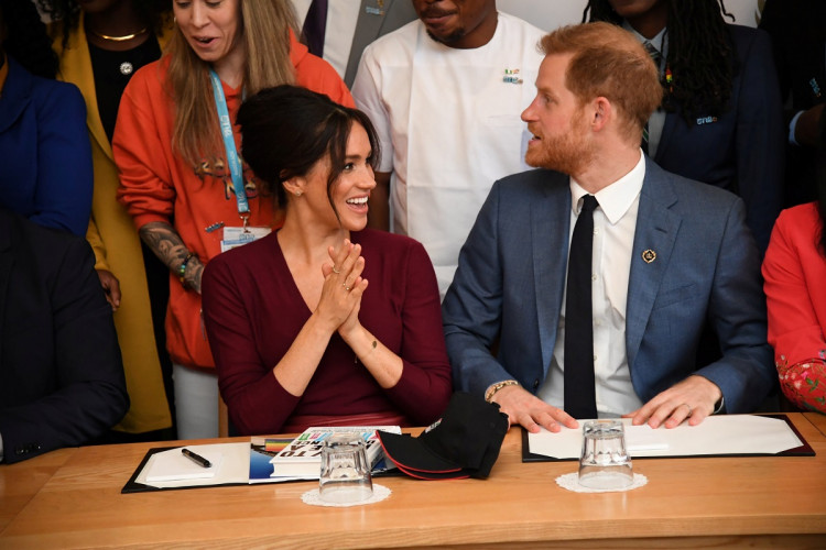 Britain's Meghan, the Duchess of Sussex, and Prince Harry, Duke of Sussex, attend a roundtable discussion with The Queen's Commonwealth Trust (QCT) and One Young World at Windsor Castle, Windsor