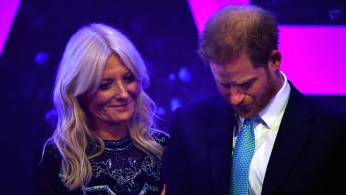 Britain's Prince Harry and Meghan, Duchess of Sussex, attend the WellChild Awards Ceremony in London