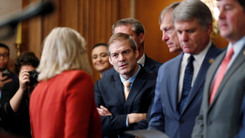 Rep. Jim Jordan (R-OH) speaks to Rep. Liz Cheney (R-WY) 