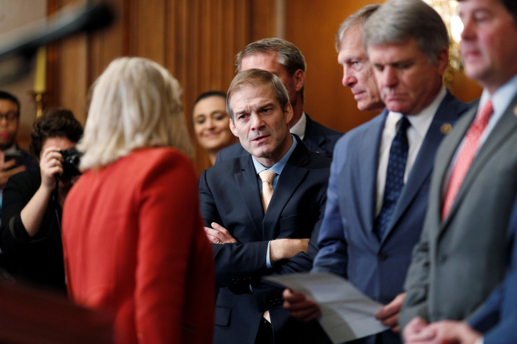 Rep. Jim Jordan (R-OH) speaks to Rep. Liz Cheney (R-WY) 