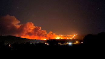 Wildfires are seen burning in Santa Paula, California, U.S.