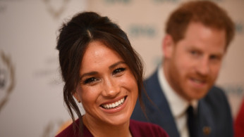 Britain's Meghan, the Duchess of Sussex, and Prince Harry, Duke of Sussex, attend a roundtable discussion on gender equality with The Queen's Commonwealth Trust (QCT) and One Young World at Windsor Castle
