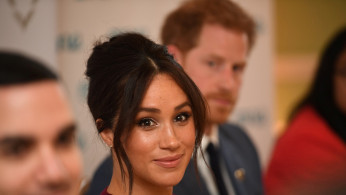 Britain's Meghan, the Duchess of Sussex, and Prince Harry, Duke of Sussex, attend a roundtable discussion on gender equality with The Queen's Commonwealth Trust (QCT) and One Young World at Windsor Castle