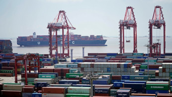 Containers are seen at the Yangshan Deep Water Port in Shanghai, China