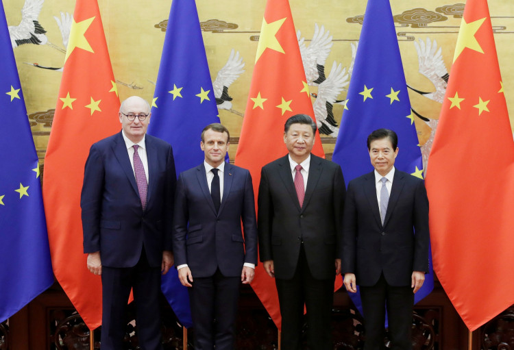 (L-R) EU Trade Commissioner-designate Phil Hogan, French President Emmanuel Macron, Chinese President Xi Jinping and Chinese Commerce Minister Zhong Shan