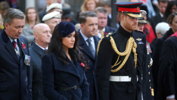 Britain's Prince Harry and Meghan, Duchess of Sussex, visit the Field of Remembrance at Westminster Abbey in London