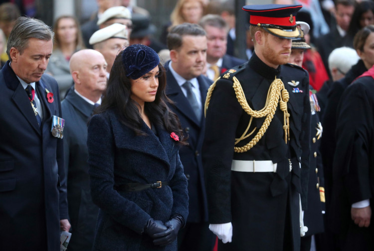 Britain's Prince Harry and Meghan, Duchess of Sussex, visit the Field of Remembrance at Westminster Abbey in London