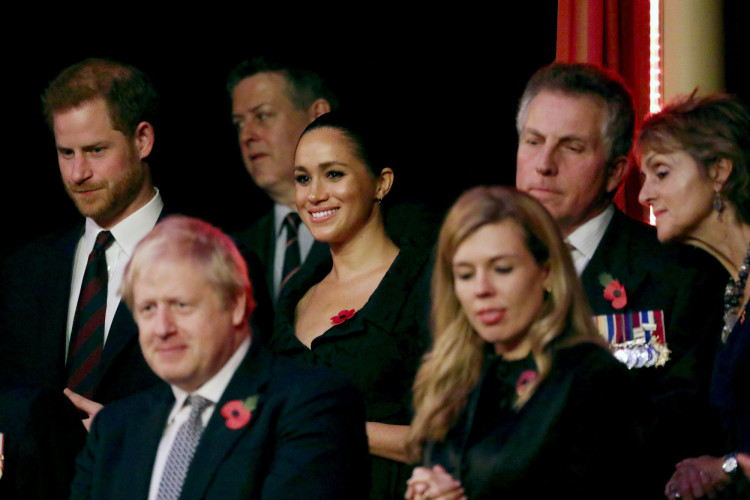 Britain's Prince Harry, Meghan, Duchess of Sussex, Prime Minister Boris Johnson and Carrie Symonds attend the Royal British Legion Festival of Remembrance at the Royal Albert Hall in London