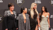Kris Jenner with Kourtney, Khloe, and Kim Kardashian.