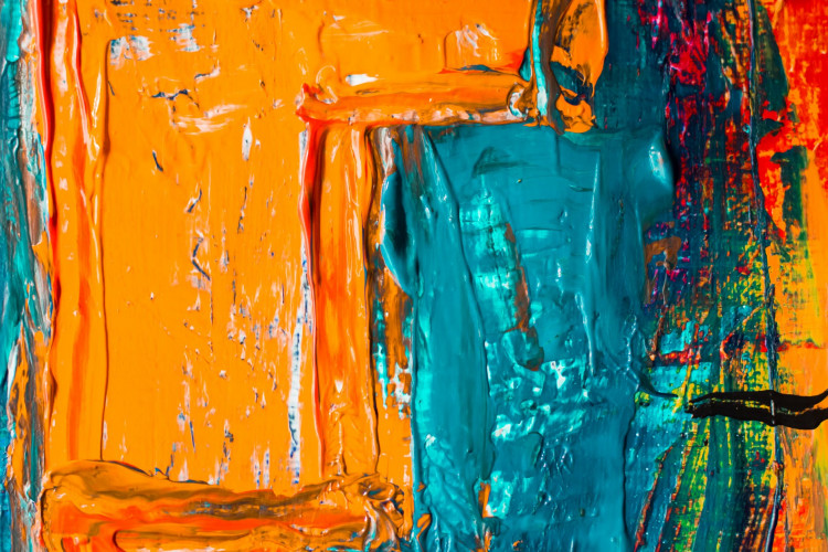Shade of orange and blue abstract paint.