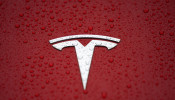 A Tesla logo is seen at a groundbreaking ceremony of Tesla Shanghai Gigafactory in Shanghai