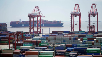 Containers are seen at the Yangshan Deep Water Port in Shanghai