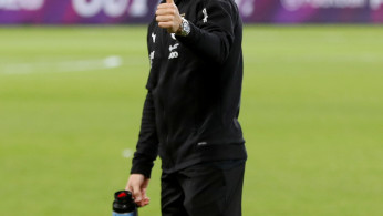 Lucas Torreira gestures as he walks around the pitch ahead of the match 